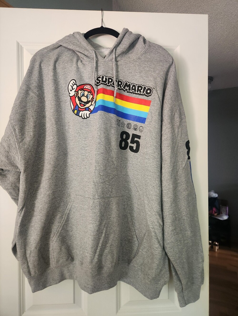 Nintendo Gray Hoodie with Super Mario Retro Rainbow Stripe & 85, Size 2XL